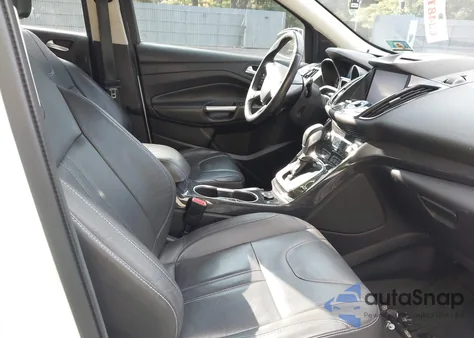 2013 Ford Escape Titanium z USA, uszkodzony, nr VIN 1FMCU9J92DUA57927